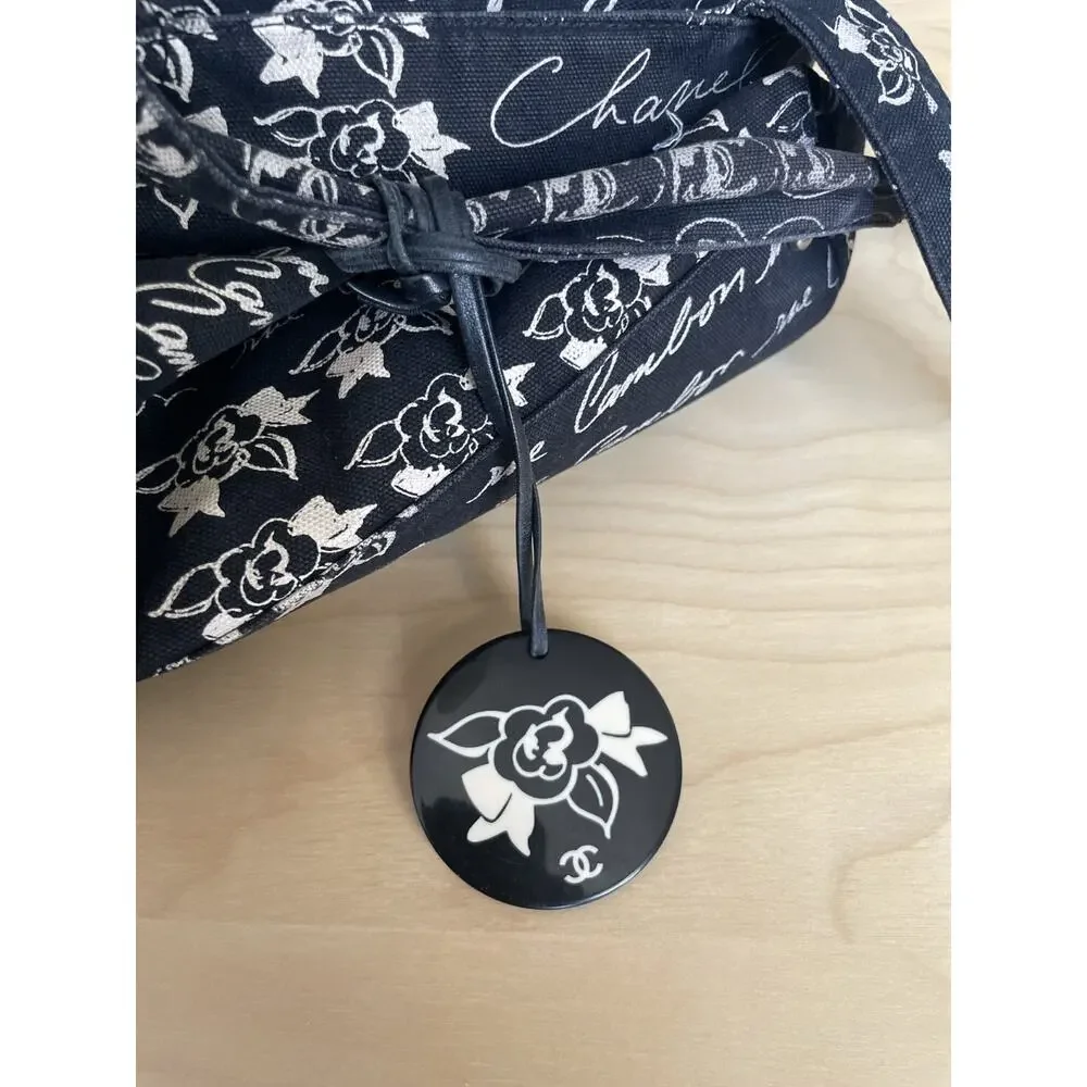 Chanel Graffiti Tote CC Print Camellia Drawstring Bag Black Cambon Mademoiselle